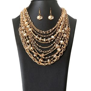 Gold Zi piece multiple necklace combined into on